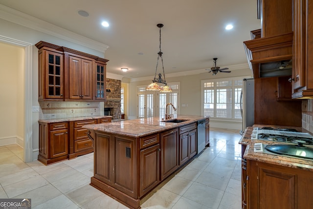 kitchen featuring decorative backsplash, brown cabinetry, a ceiling fan, dishwasher, and a sink