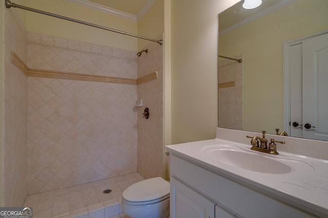 bathroom with vanity, ornamental molding, a shower stall, and toilet