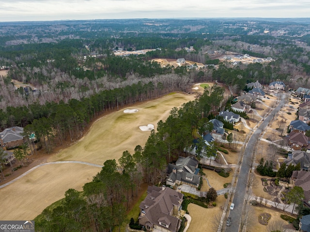 aerial view with golf course view and a residential view