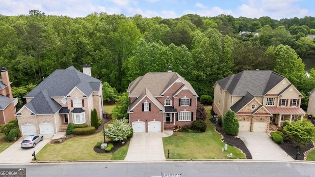 12892 Waterside Dr, Milton, GA 30004 - aerial view featuring a wooded view