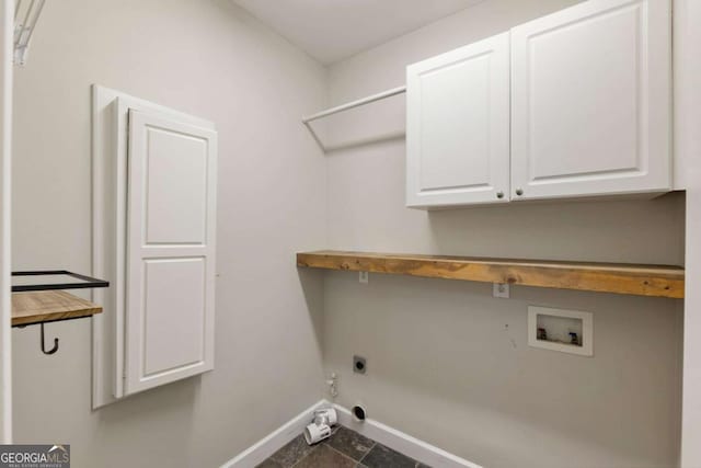 12892 Waterside Dr, Milton, GA 30004 - washroom featuring baseboards, washer hookup, cabinet space, and hookup for an electric dryer