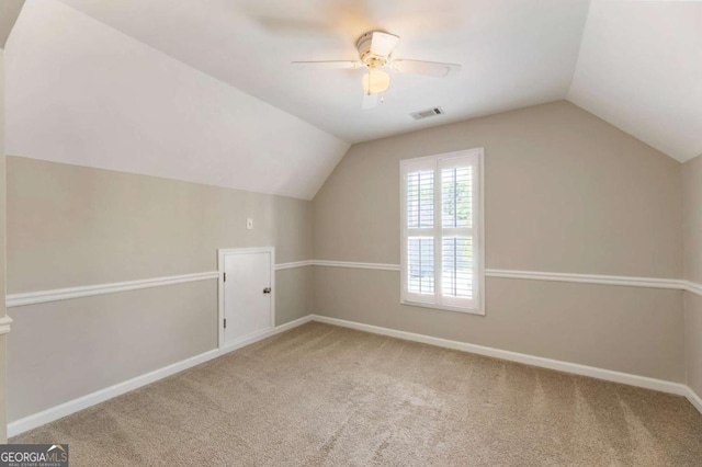12892 Waterside Dr, Milton, GA 30004 - additional living space featuring carpet floors, ceiling fan, lofted ceiling, and visible vents