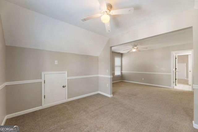 12892 Waterside Dr, Milton, GA 30004 - additional living space featuring carpet flooring, ceiling fan, vaulted ceiling, and baseboards