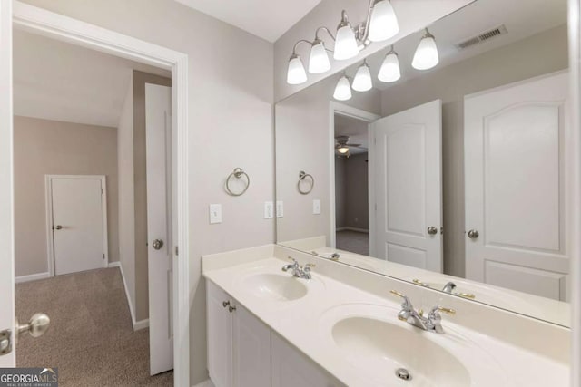 12892 Waterside Dr, Milton, GA 30004 - full bath featuring double vanity, visible vents, and a sink