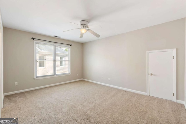 12892 Waterside Dr, Milton, GA 30004 - unfurnished room with baseboards, carpet, a ceiling fan, and visible vents
