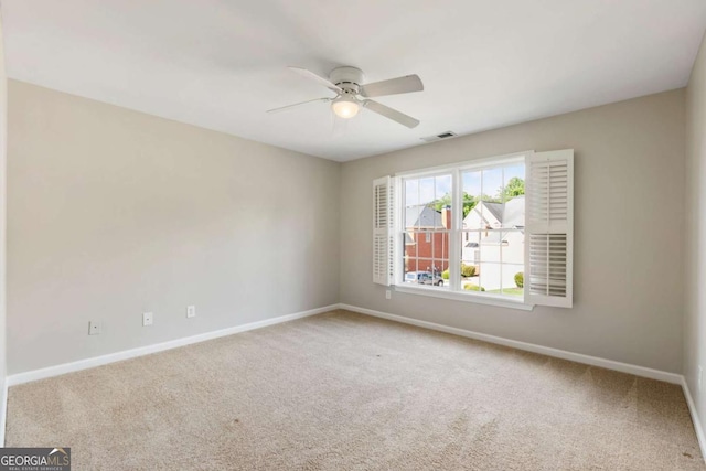 12892 Waterside Dr, Milton, GA 30004 - unfurnished room featuring baseboards, a ceiling fan, and carpet