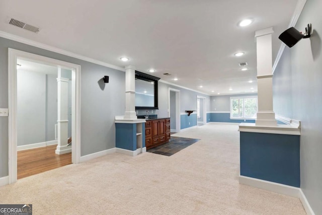 12892 Waterside Dr, Milton, GA 30004 - unfurnished living room with decorative columns, visible vents, ornamental molding, carpet, and recessed lighting