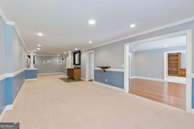 12892 Waterside Dr, Milton, GA 30004 - finished basement with crown molding, recessed lighting, baseboards, and light colored carpet