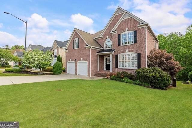 12892 Waterside Dr, Milton, GA 30004 - traditional-style house with an attached garage, concrete driveway, a front yard, and brick siding