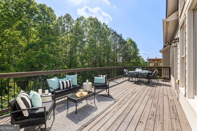12892 Waterside Dr, Milton, GA 30004 - wooden terrace featuring an outdoor hangout area and outdoor dining area