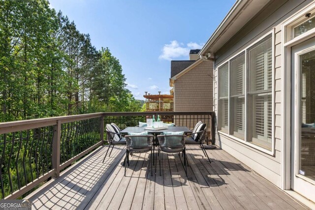 12892 Waterside Dr, Milton, GA 30004 - deck with outdoor dining area