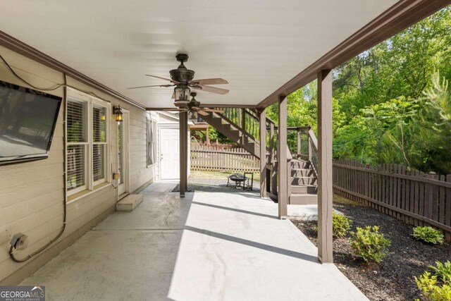 12892 Waterside Dr, Milton, GA 30004 - view of patio with ceiling fan, stairs, and a fenced backyard