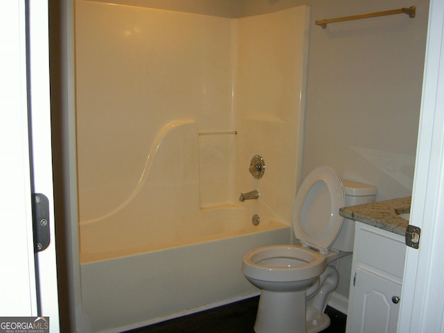 214 Oak Cir, Stockbridge, GA 30281 - bathroom featuring vanity, toilet, and bathing tub / shower combination