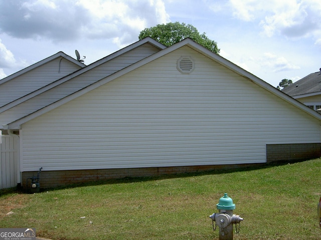 214 Oak Cir, Stockbridge, GA 30281 - view of home's exterior with a yard