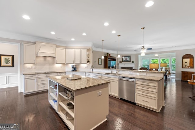 kitchen with stainless steel dishwasher, custom range hood, a peninsula, and open floor plan