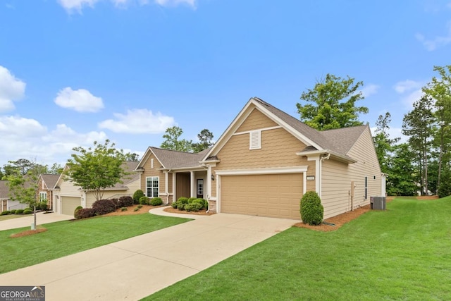 craftsman-style home with central AC unit, an attached garage, driveway, and a front lawn