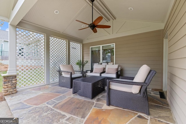 view of patio featuring ceiling fan and an outdoor living space