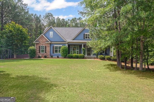 68 Timber Creek Estates Dr, Sharpsburg, GA 30277 - craftsman-style home with covered porch and a front yard