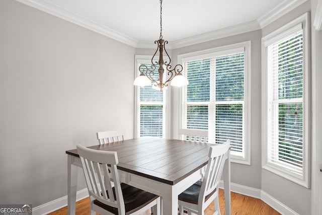 68 Timber Creek Estates Dr, Sharpsburg, GA 30277 - dining area with baseboards, a notable chandelier, and a wealth of natural light