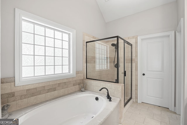 68 Timber Creek Estates Dr, Sharpsburg, GA 30277 - full bath featuring tile patterned floors, a stall shower, a garden tub, and lofted ceiling