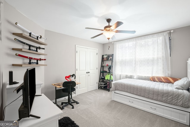 68 Timber Creek Estates Dr, Sharpsburg, GA 30277 - bedroom with a ceiling fan, light carpet, and a closet