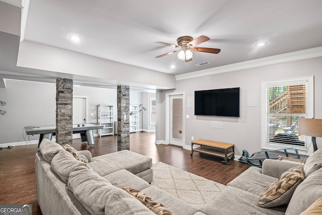 68 Timber Creek Estates Dr, Sharpsburg, GA 30277 - living room with ornate columns, baseboards, ceiling fan, and dark wood-style flooring