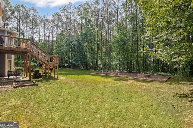 68 Timber Creek Estates Dr, Sharpsburg, GA 30277 - view of yard with stairs, a deck, and a patio