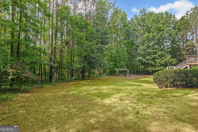 68 Timber Creek Estates Dr, Sharpsburg, GA 30277 - view of yard featuring a forest view and stairs
