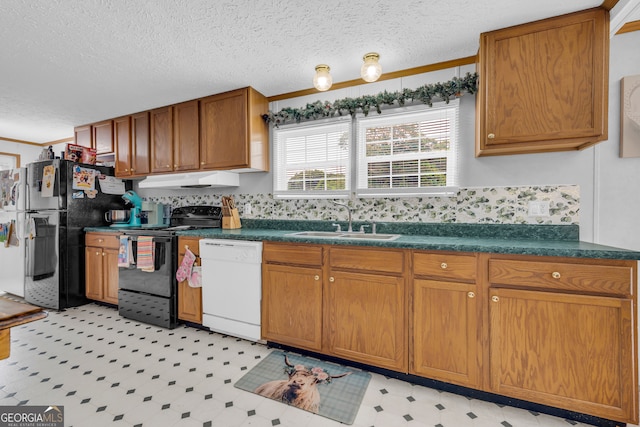 187 New Hope Rd, Canon, GA 30520 - kitchen featuring dark countertops, light floors, under cabinet range hood, a sink, and black appliances