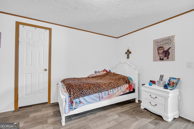 187 New Hope Rd, Canon, GA 30520 - bedroom featuring a textured ceiling, ornamental molding, and wood finished floors