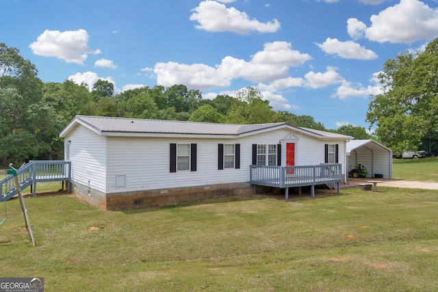 187 New Hope Rd, Canon, GA 30520 - manufactured / mobile home with a front lawn, a wooden deck, crawl space, a detached carport, and metal roof