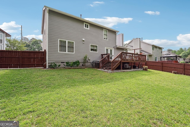 5022 Audubon Pl, Norcross, GA 30093 - rear view of property featuring a fenced backyard, a lawn, a wooden deck, and stairs