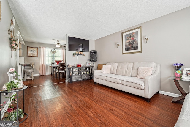 5022 Audubon Pl, Norcross, GA 30093 - living room with baseboards, a textured ceiling, ceiling fan, and wood finished floors