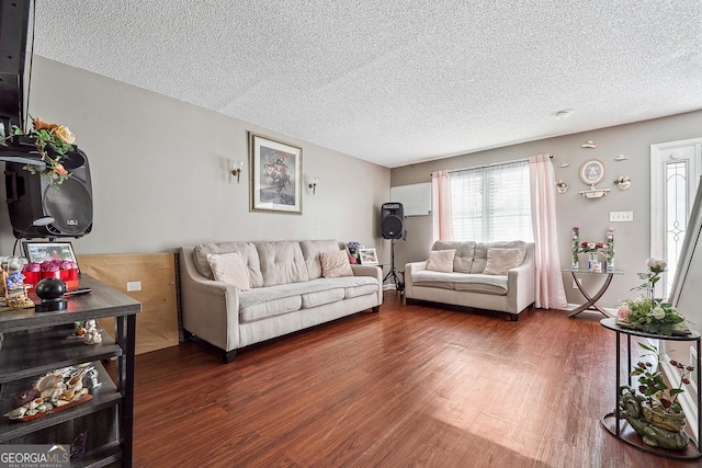 5022 Audubon Pl, Norcross, GA 30093 - living area with a textured ceiling and wood finished floors