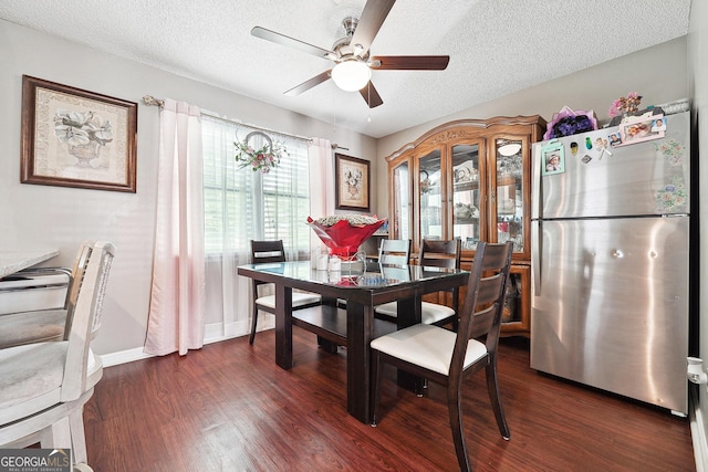 5022 Audubon Pl, Norcross, GA 30093 - dining area with a textured ceiling, ceiling fan, dark wood finished floors, and baseboards