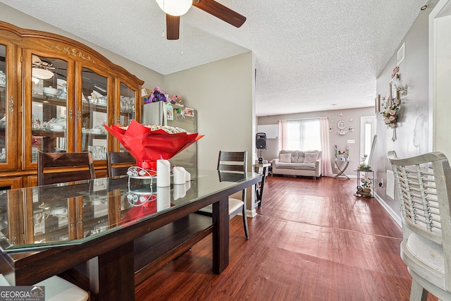 5022 Audubon Pl, Norcross, GA 30093 - dining room with a textured ceiling, ceiling fan, wood finished floors, and visible vents