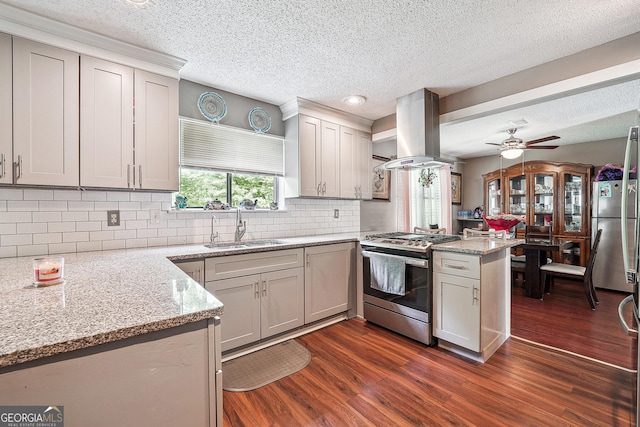 5022 Audubon Pl, Norcross, GA 30093 - kitchen with appliances with stainless steel finishes, a sink, a textured ceiling, a peninsula, and island range hood