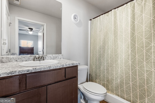 400 Toronto Cir, Hampton, GA 30228 - bathroom with vanity, toilet, a ceiling fan, a shower with curtain, and visible vents