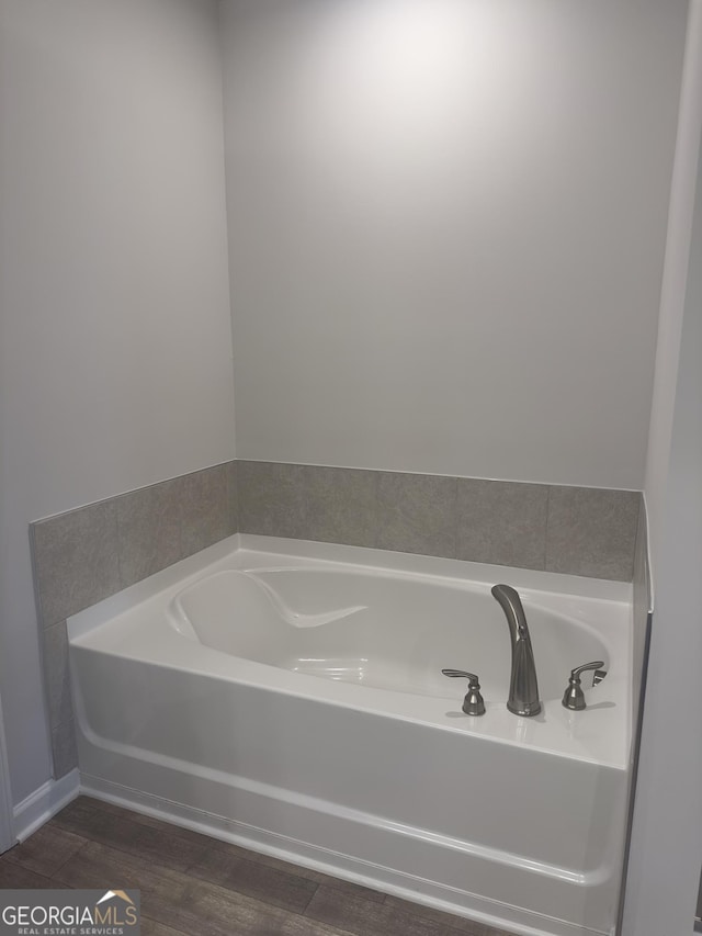 1155 Park Center Cir NW, Austell, GA 30168 - full bathroom with wood finished floors and a bath