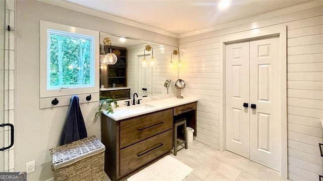bathroom featuring vanity and ornamental molding