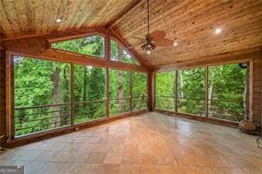8190 Old Mill Dr, Gainesville, GA 30506 - unfurnished sunroom featuring wooden ceiling, lofted ceiling, healthy amount of natural light, and stone finish floors