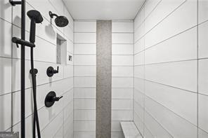 8190 Old Mill Dr, Gainesville, GA 30506 - bathroom with a tile shower