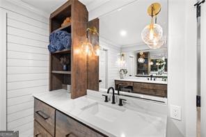 8190 Old Mill Dr, Gainesville, GA 30506 - bathroom with crown molding and vanity