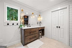 8190 Old Mill Dr, Gainesville, GA 30506 - bathroom featuring vanity, ornamental molding, and baseboards