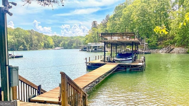 view of dock with a water view