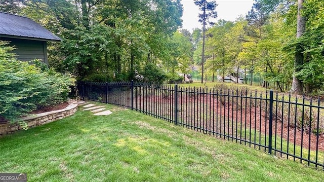 view of yard featuring fence