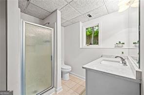 8190 Old Mill Dr, Gainesville, GA 30506 - full bathroom with a shower stall, toilet, vanity, tile patterned floors, and a paneled ceiling