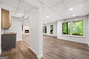 8190 Old Mill Dr, Gainesville, GA 30506 - corridor with baseboards, dark wood finished floors, a paneled ceiling, recessed lighting, and a chandelier