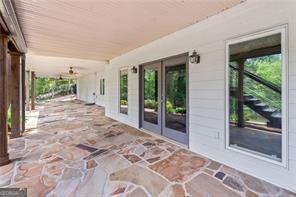 8190 Old Mill Dr, Gainesville, GA 30506 - view of patio / terrace with french doors and stairs