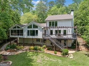 8190 Old Mill Dr, Gainesville, GA 30506 - rear view of house featuring a pergola, a wooden deck, stairway, a chimney, and a lawn